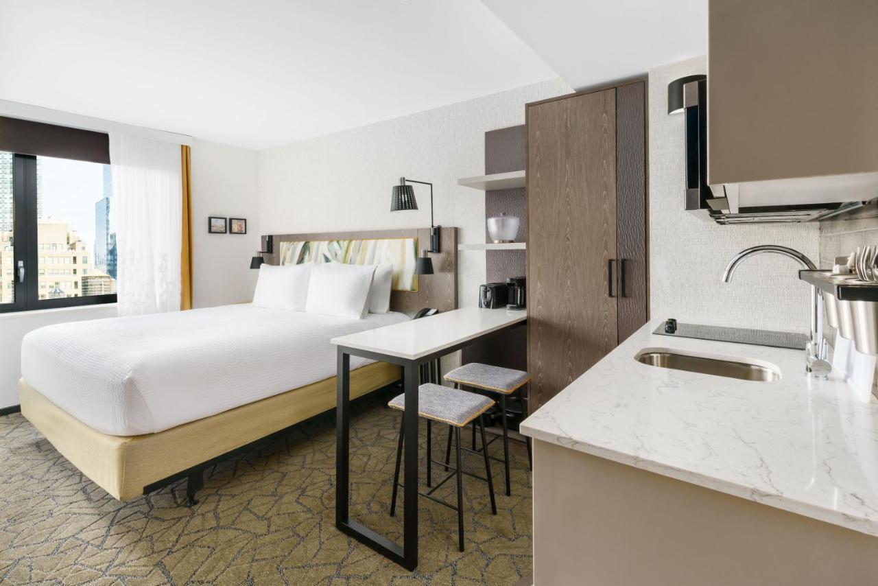 Studio Lit King-Size avec Kitchenette Complète - Vue sur Ville