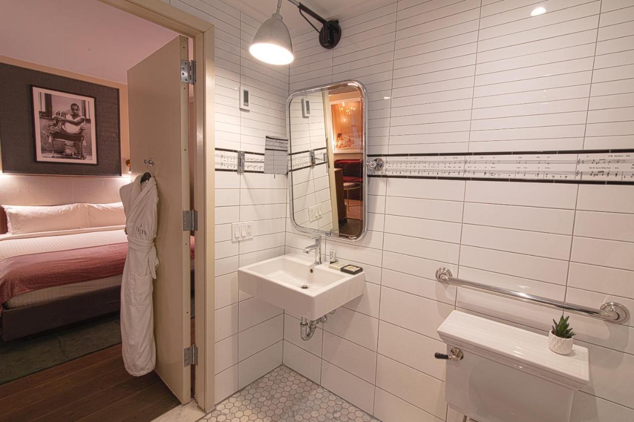 Quarto Deluxe com Cama Queen-size Acessível para Hóspedes com Mobilidade Reduzida