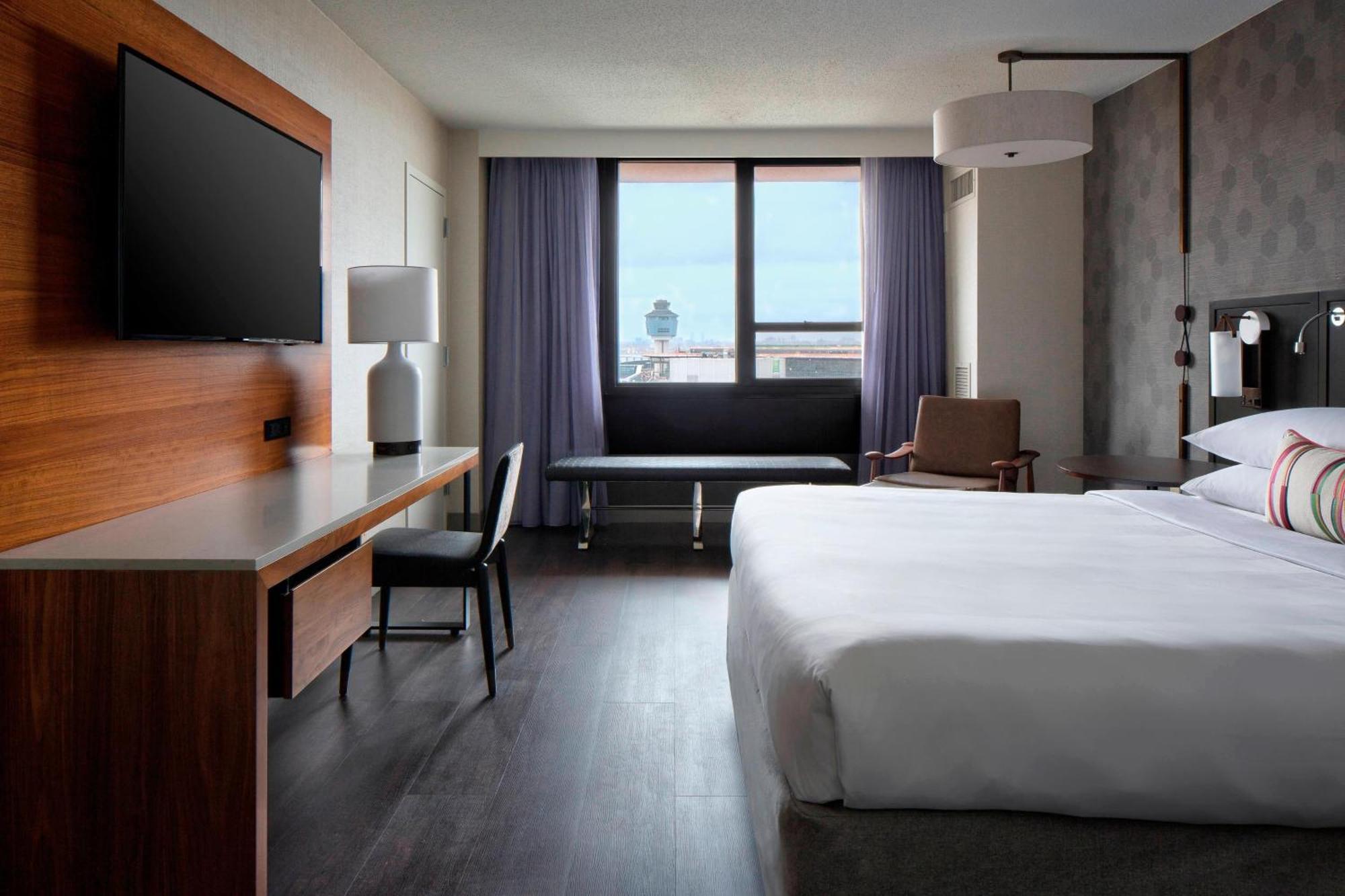 Guest Room with King Bed and Airport View