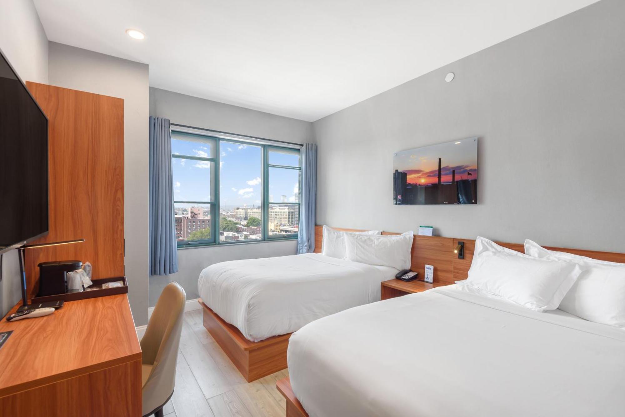 Quarto Duplo Superior com 2 Camas de Casal