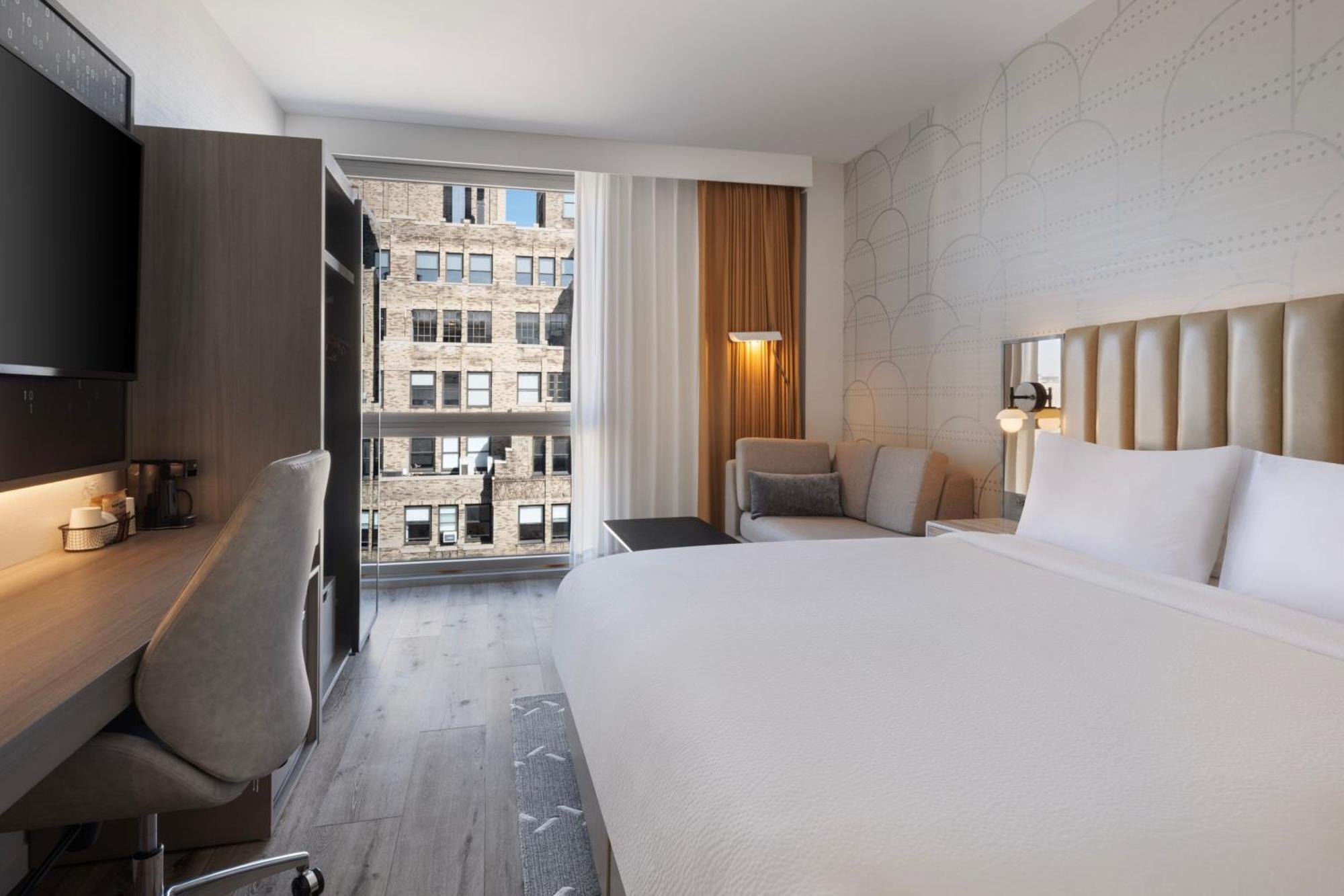 Quarto King com Sofá-cama