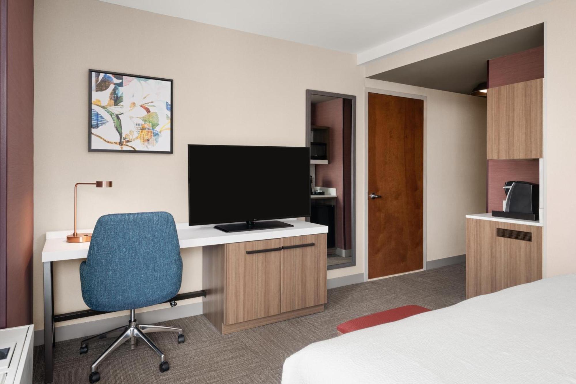 Hoekkamer met Kingsize Bed en Uitzicht op de Stad